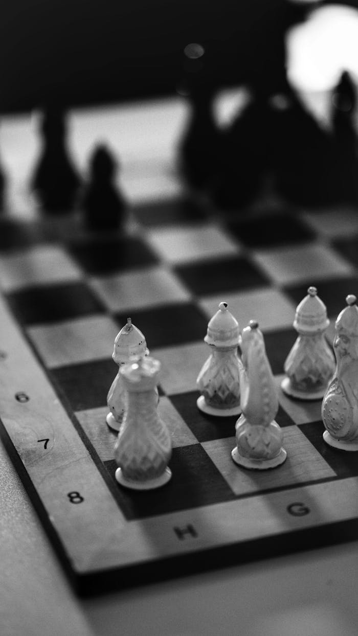 Close-up black and white chess game highlighting strategic potential.